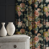 Curtain in a printed velvet fabric showcasing the abundant pattern of stylised flowers in blue