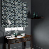 Velvet blind upholstered in a printed velvet fabric with an oriental geometric design in blue colours