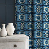 Patterned velvet curtains featuring a fun, jazzy pattern in navy