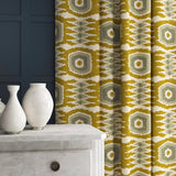 Patterned velvet curtains featuring a fun, jazzy pattern in Ochre.