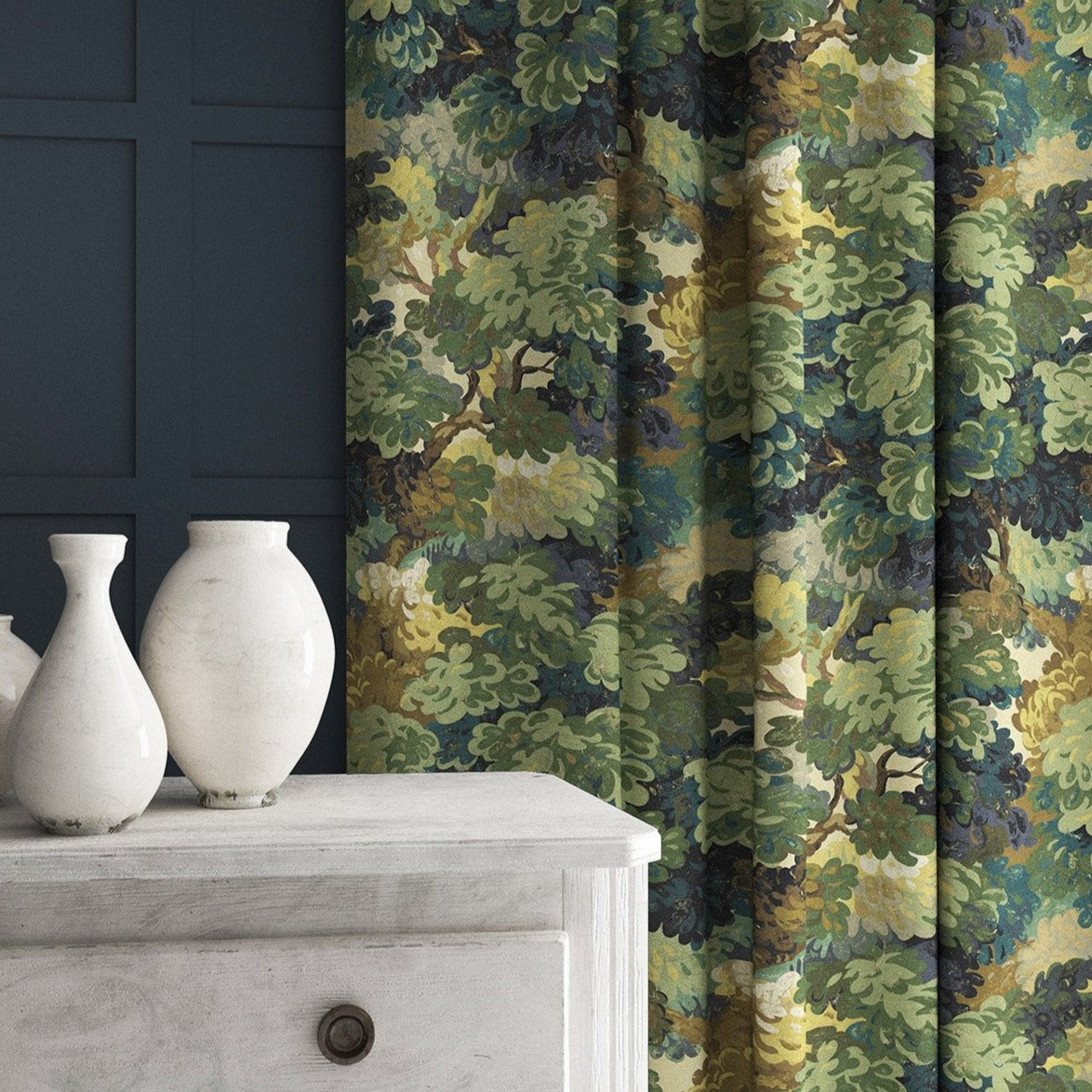 Curtain made from a printed velvet fabric featuring a classic oak leaf design in green.