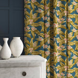 Curtain in a dark blue velvet fabric with ochre leaves and pretty flowers.