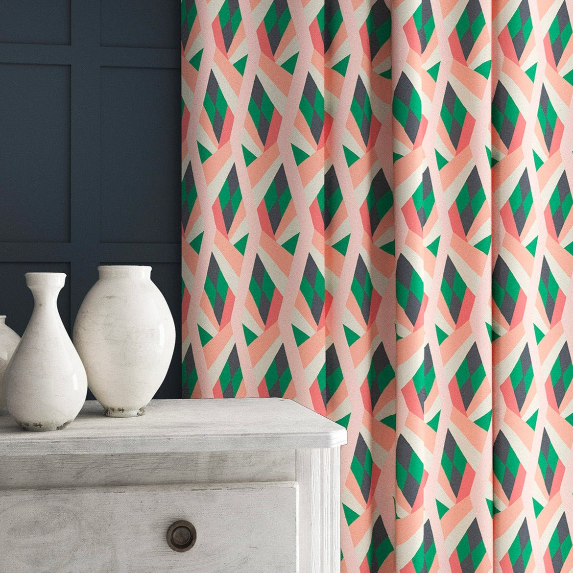 Velvet curtains in a velvet fabric with a stain resistant finish and geometric print in peach and green colours