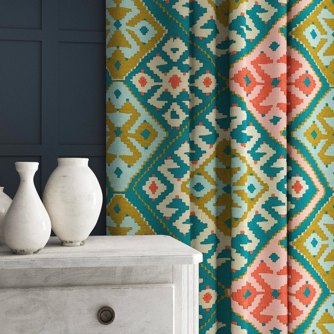 Velvet curtains in a teal and peach kilim pattern.