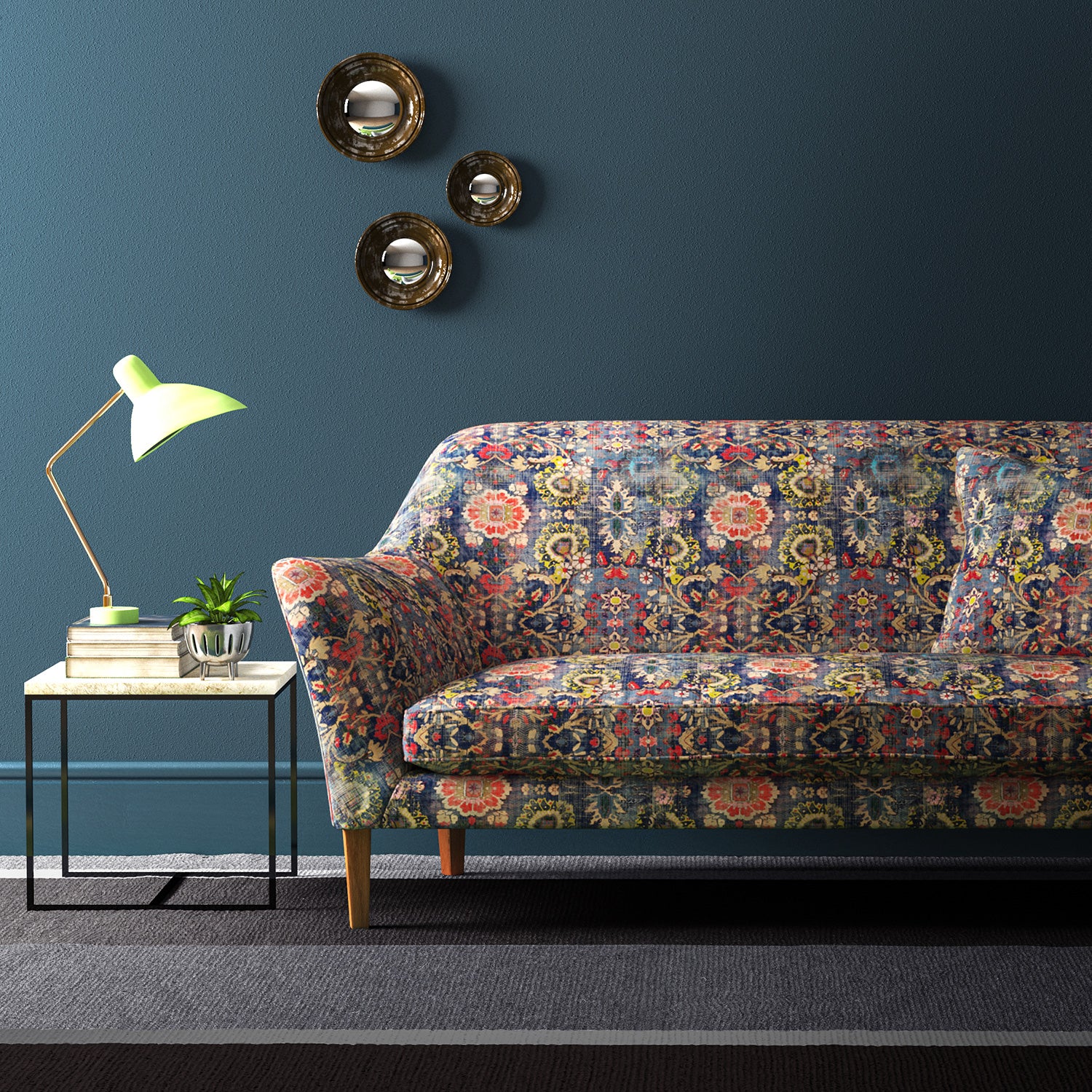 Sofa covered in a printed velvet fabric based on a classic Persian rug design.