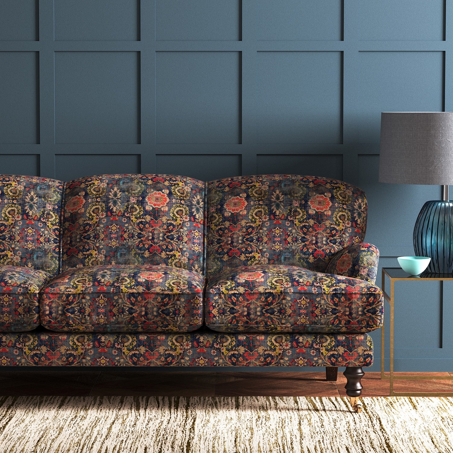 Sofa covered in a printed velvet fabric based on a classic Persian rug design.