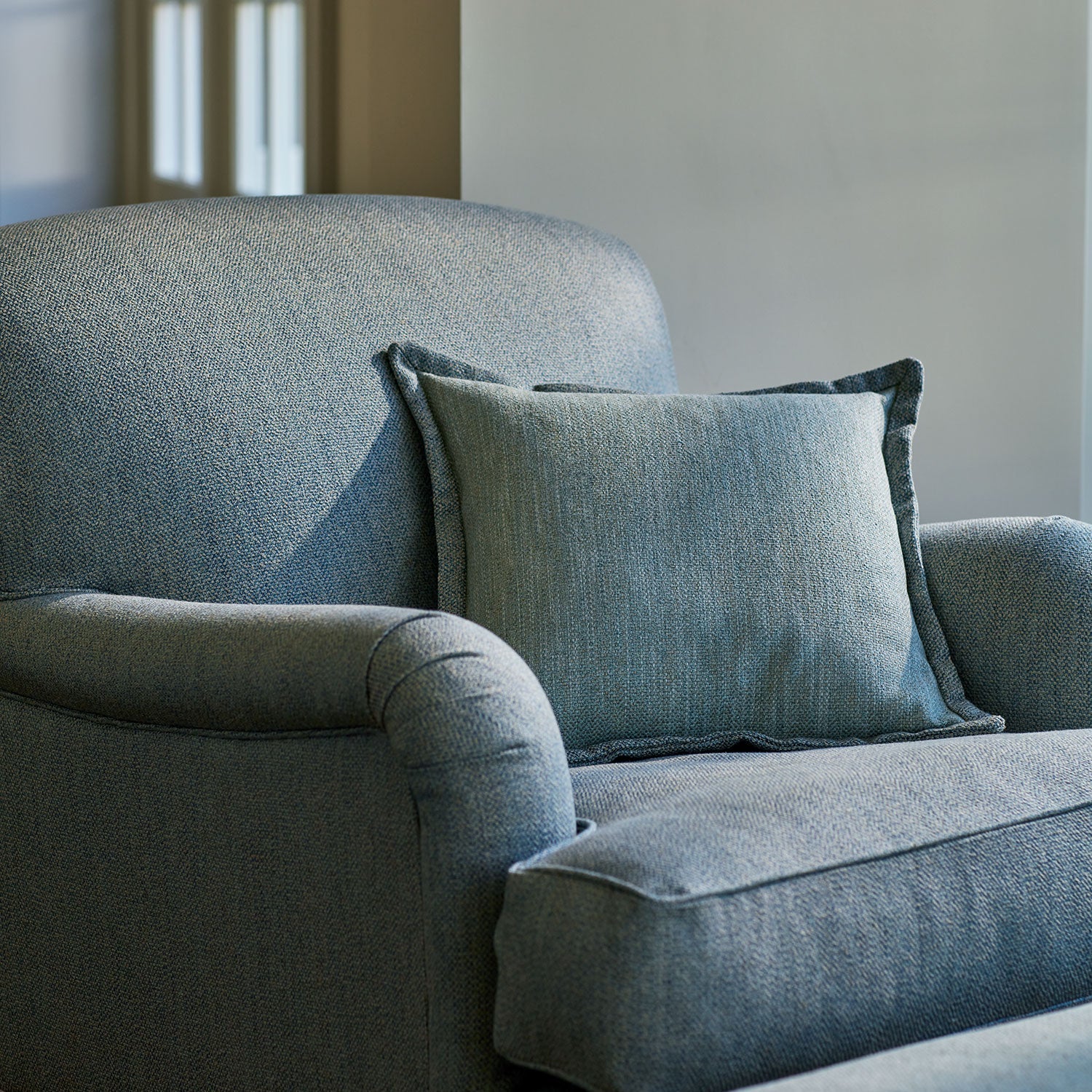 Armchair in Loxley by Linwood – Italian-woven blue weave.