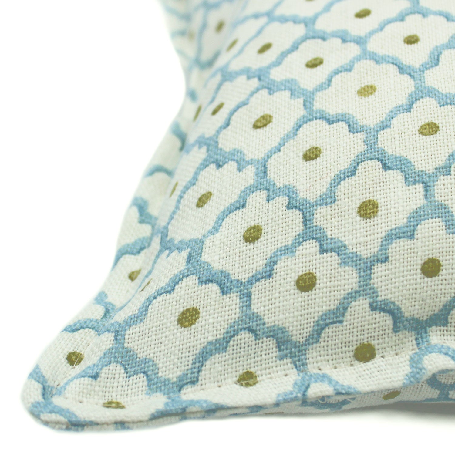 A blue, yellow and cream linen cushion with a trellis pattern.
