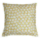 A yellow, cream and black linen cushion with a all-over repeat pattern.