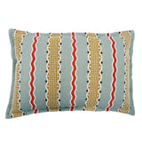 Decorative cushion with striped pattern on a light blue background