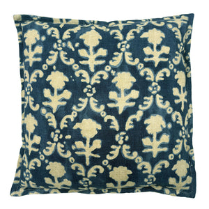 Decorative pillow with floral pattern on a blue background