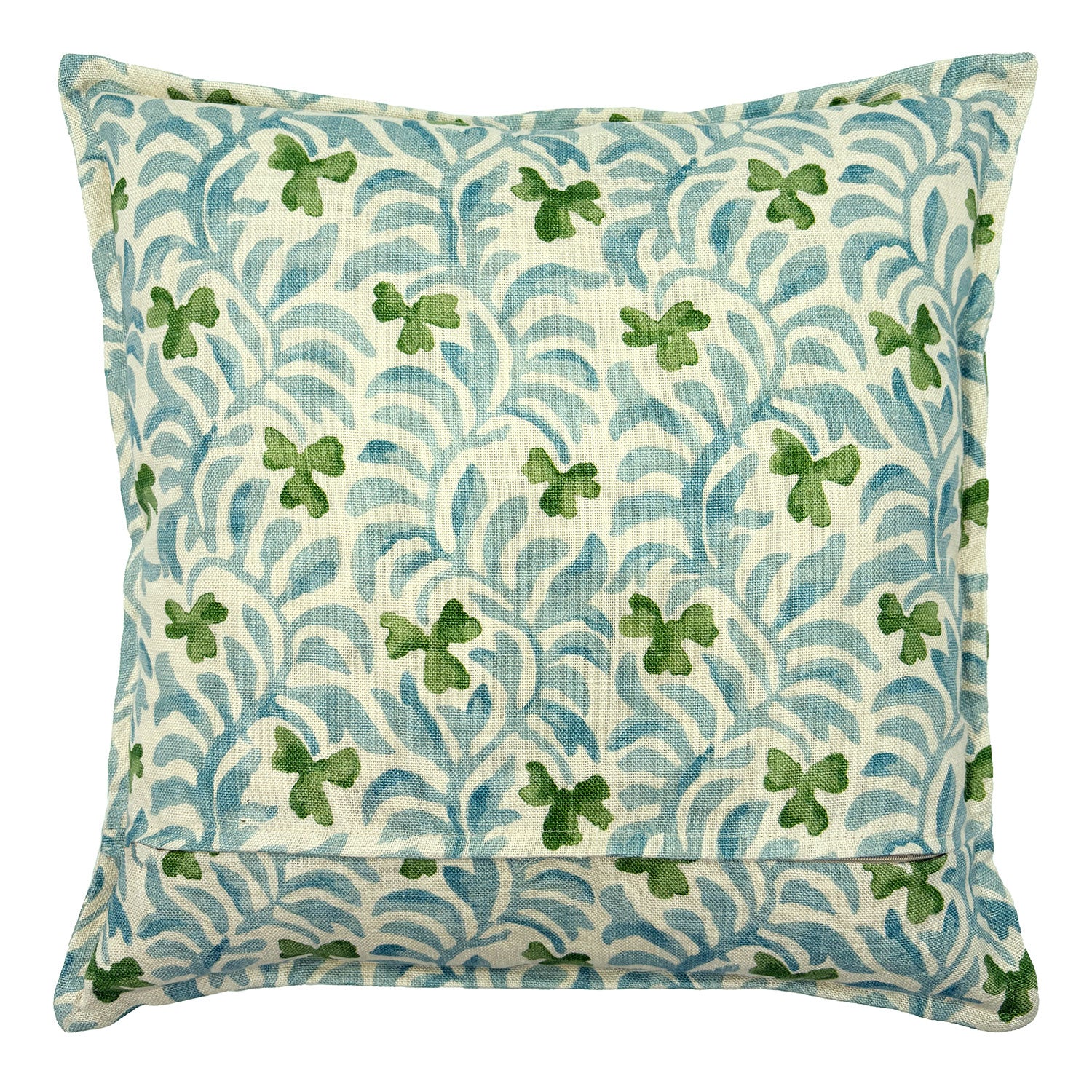 Decorative cushion with a pale blue and green floral pattern.