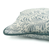 Close-up side view of Linwood cushion in Blythe, Soft Blue showing fabric texture and piping in a complementary blue linen.