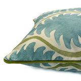 Blue velvet cushion with a stylised fern pattern. 