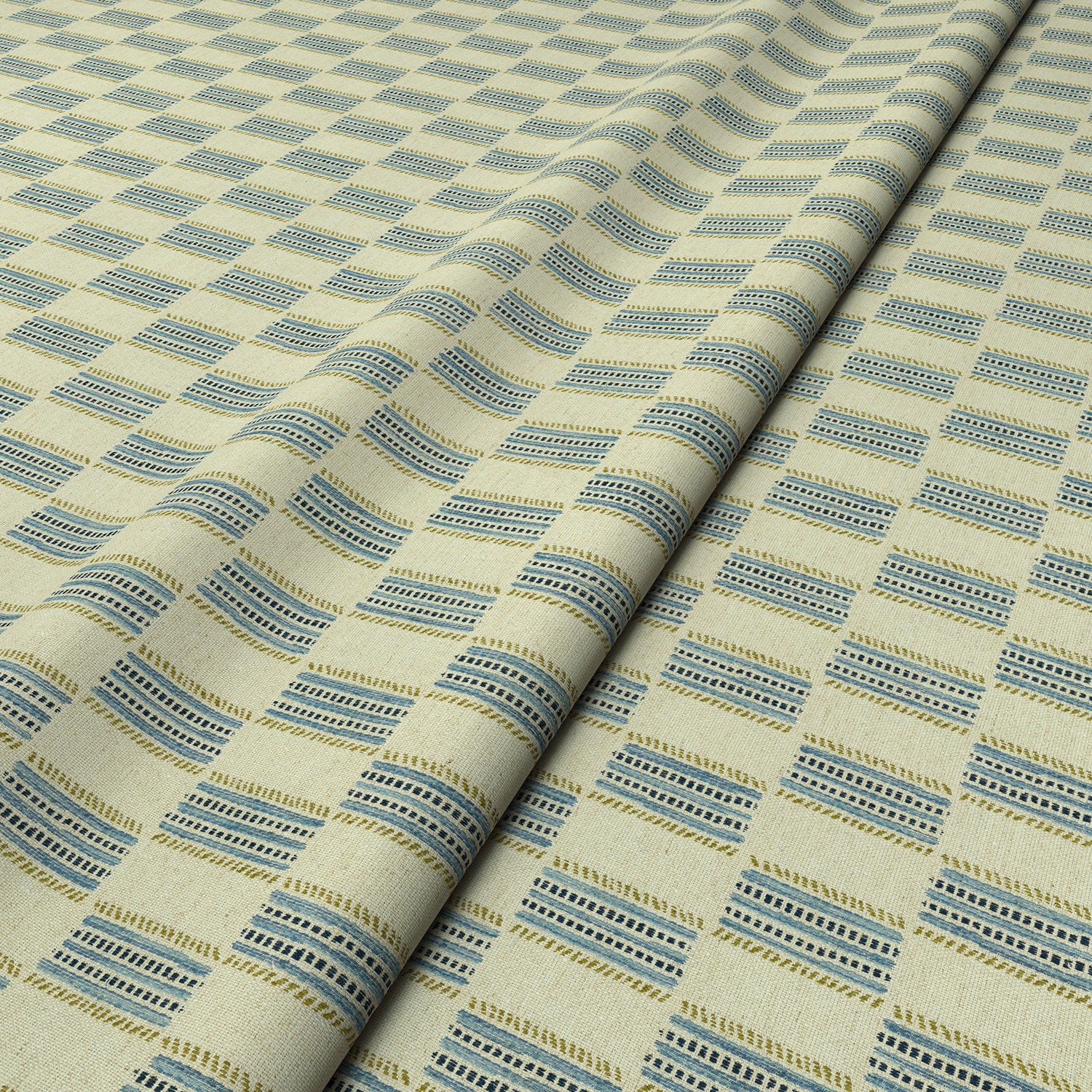 Strata fabric in Bluestone, styled in a wave to show horizontal structure and depth.