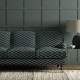 Sofa upholstered in Strata fabric in Denim, highlighting horizontal texture and tonal depth.