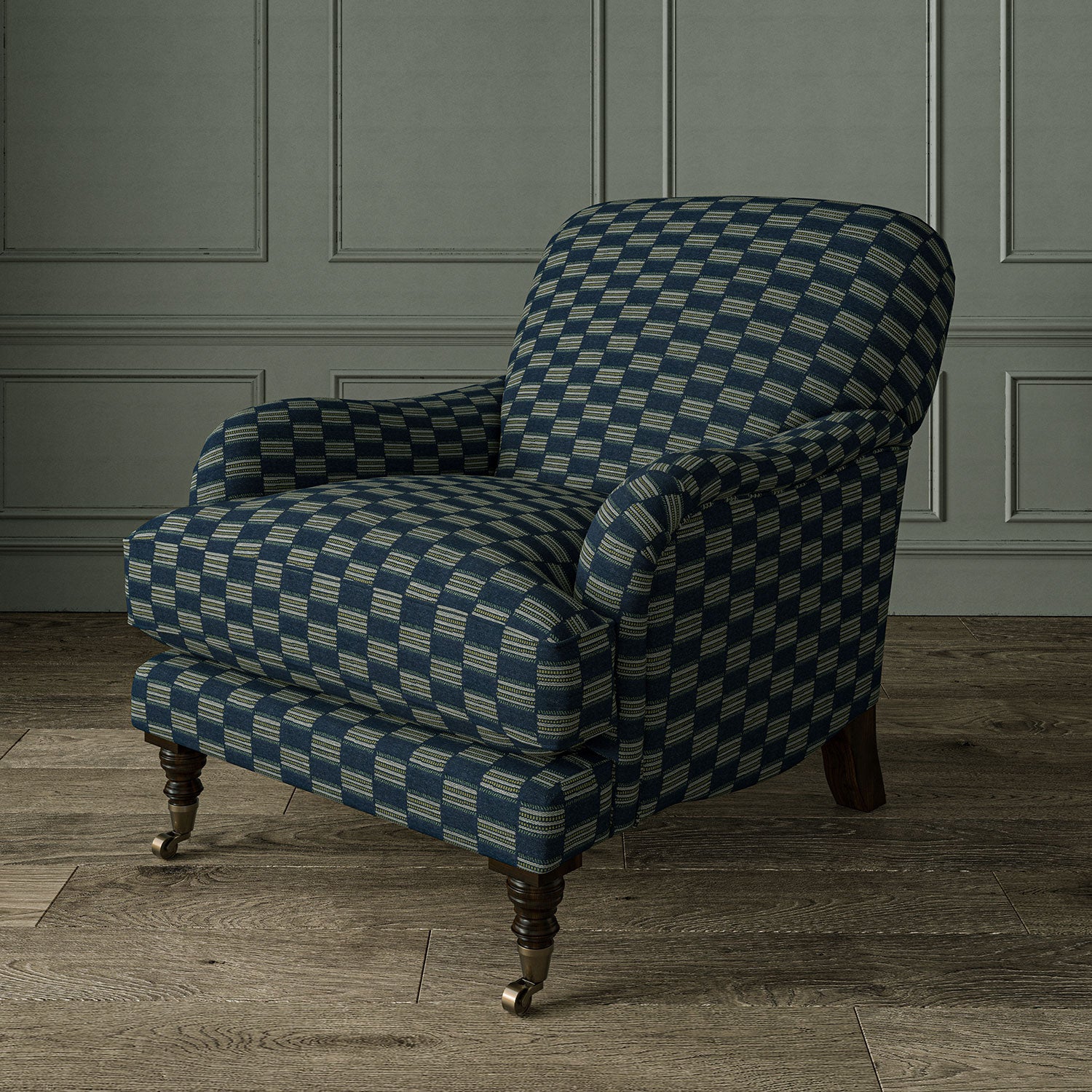 Armchair upholstered in Strata fabric in Denim, highlighting horizontal texture and tonal depth.