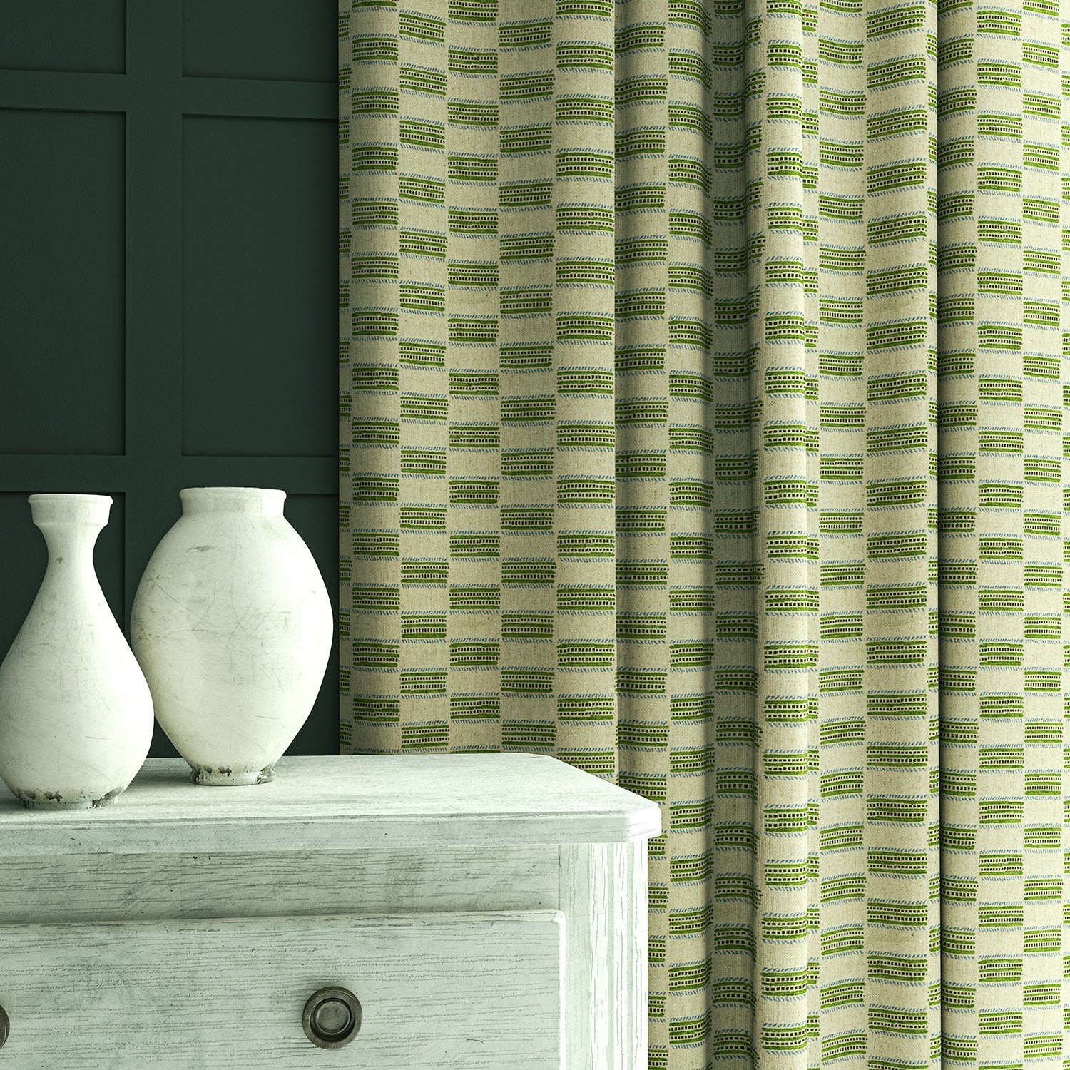 Curtains in Strata fabric showing gentle horizontal texture and soft drape.