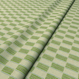 Strata fabric styled in a wave to show horizontal structure and depth.