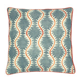A blue, orange and cream linen cushion with a all-over repeat pattern and linen piping.