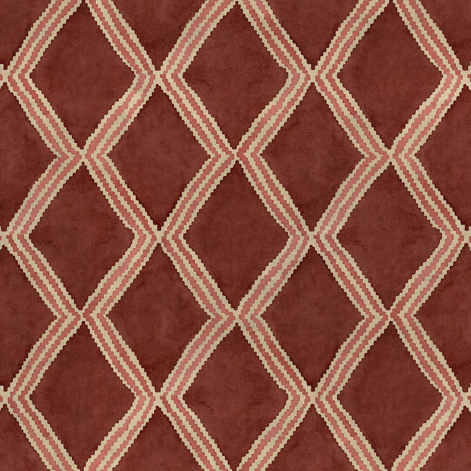 Close-up of red and pink printed velvet fabric featuring an irregular diamond motif with a soft, luxurious pile. 