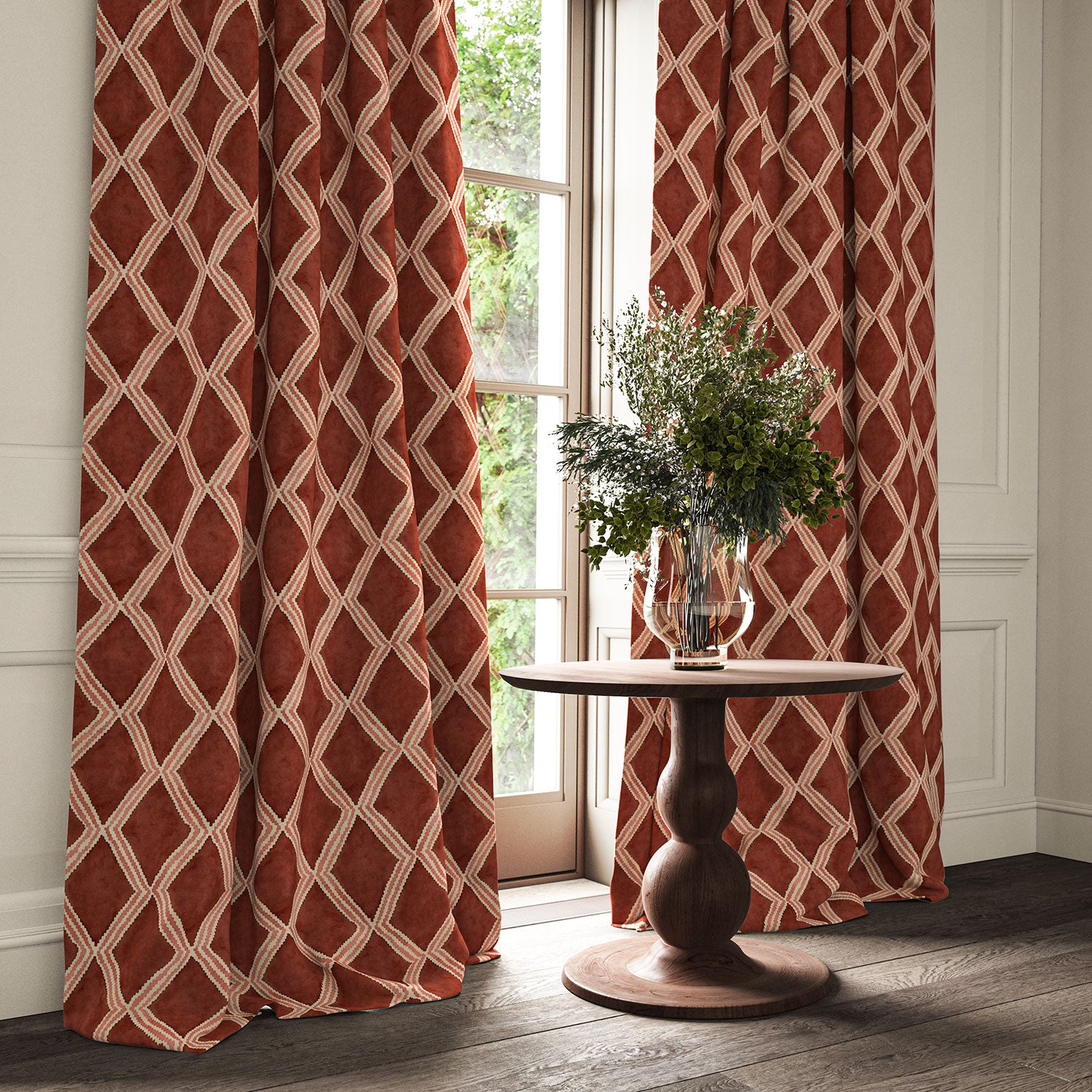 Red and pink printed velvet curtains with an irregular diamond pattern framing a tall window.