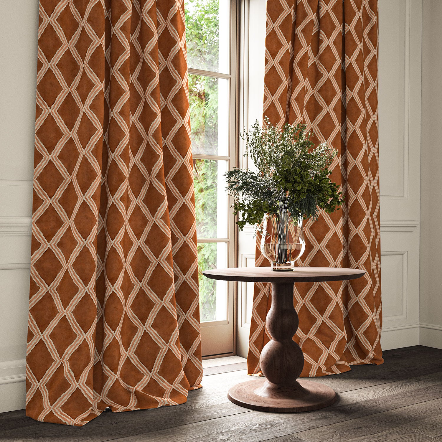 Ginger/brown printed velvet curtains with an irregular diamond pattern framing a tall window.