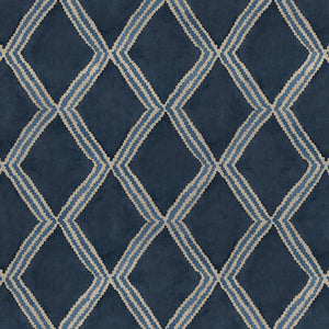 Close-up of blue printed velvet fabric featuring an irregular diamond motif with a soft, luxurious pile. 