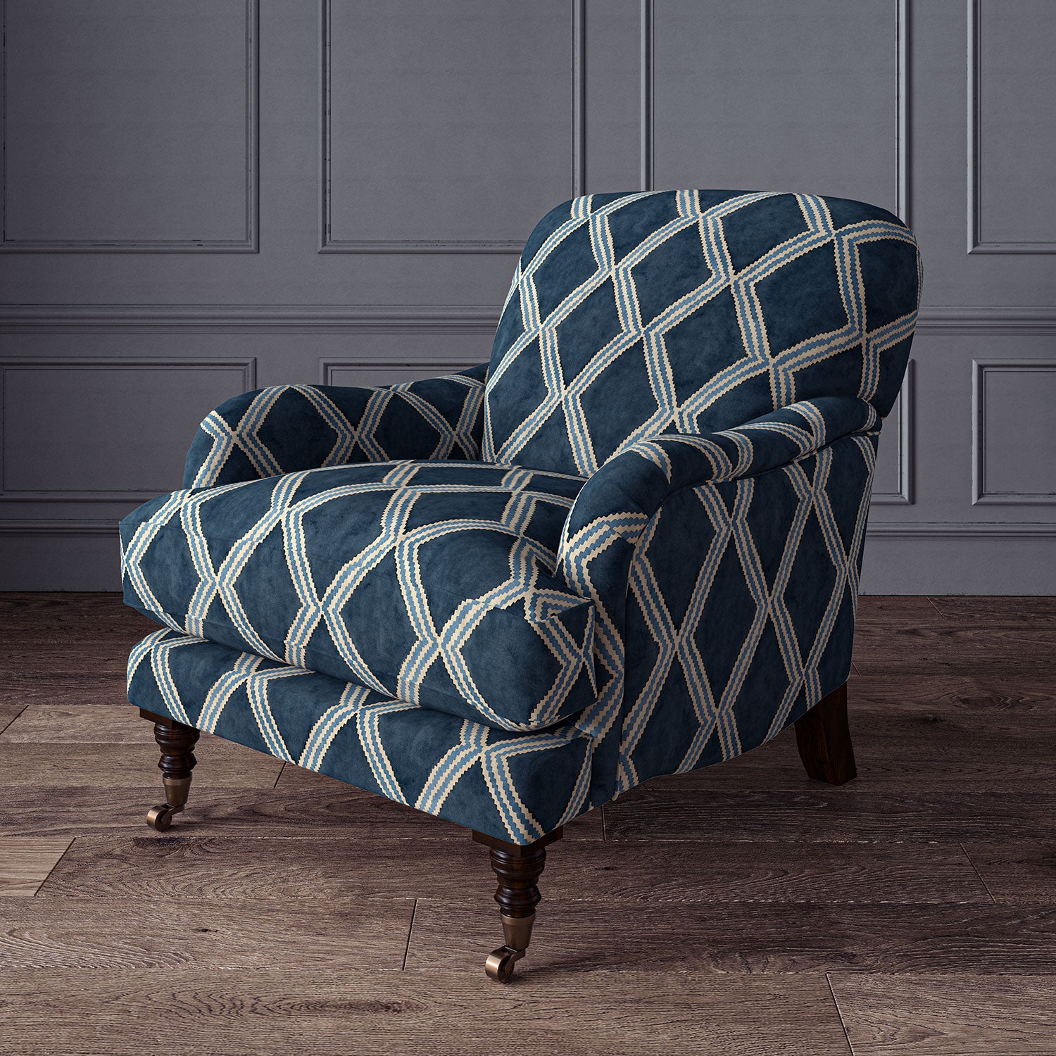 Accent chair upholstered in blue printed velvet with an irregular diamond pattern, showcasing the fabric’s rich texture. 