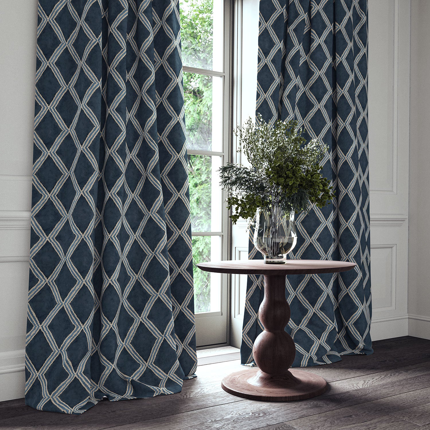 Blue printed velvet curtains with an irregular diamond pattern framing a tall window.