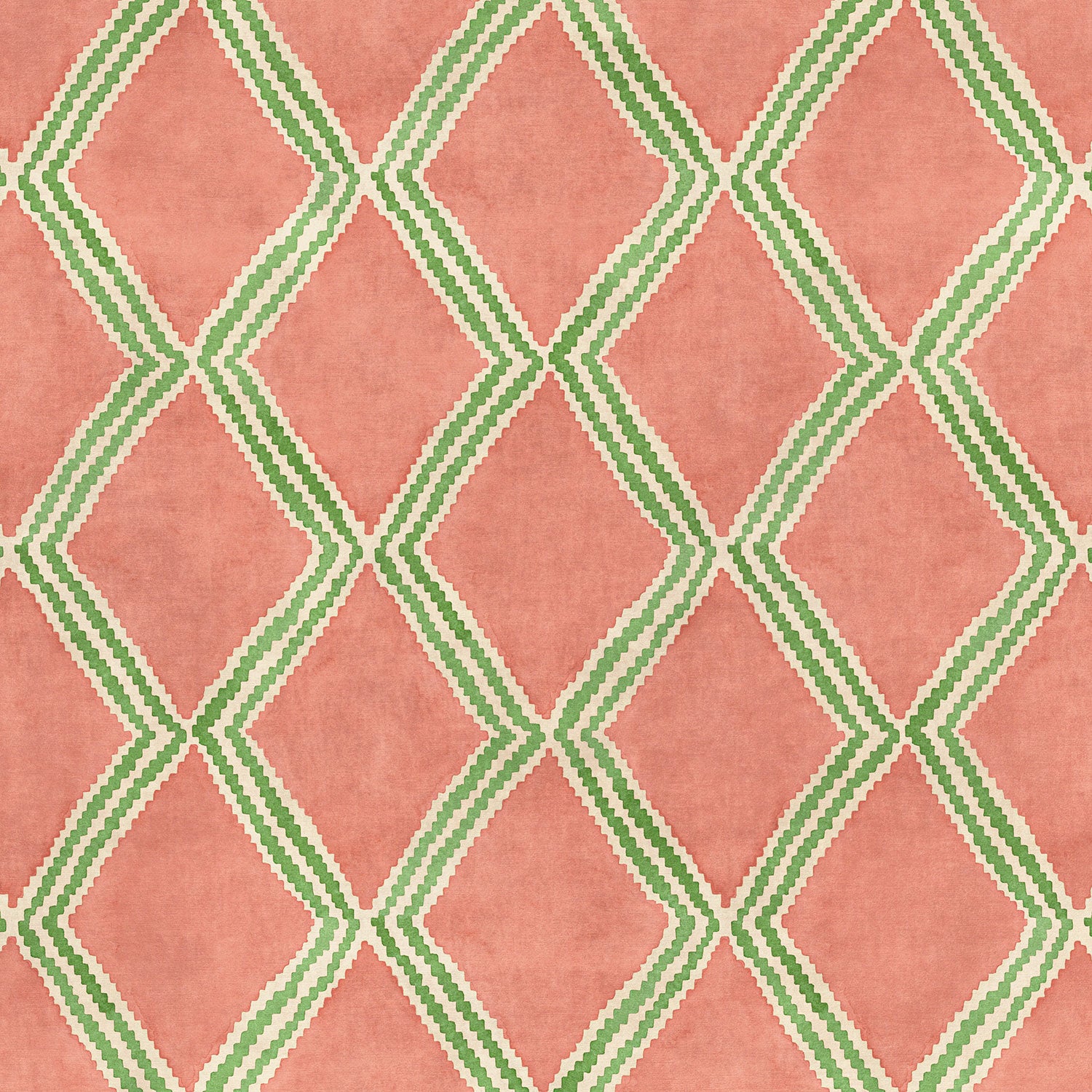 Close-up of orange and green printed velvet fabric featuring an irregular diamond motif with a soft, luxurious pile. 