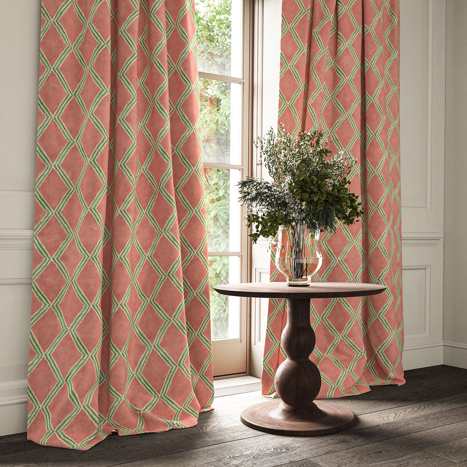 Orange and green printed velvet curtains with an irregular diamond pattern framing a tall window.