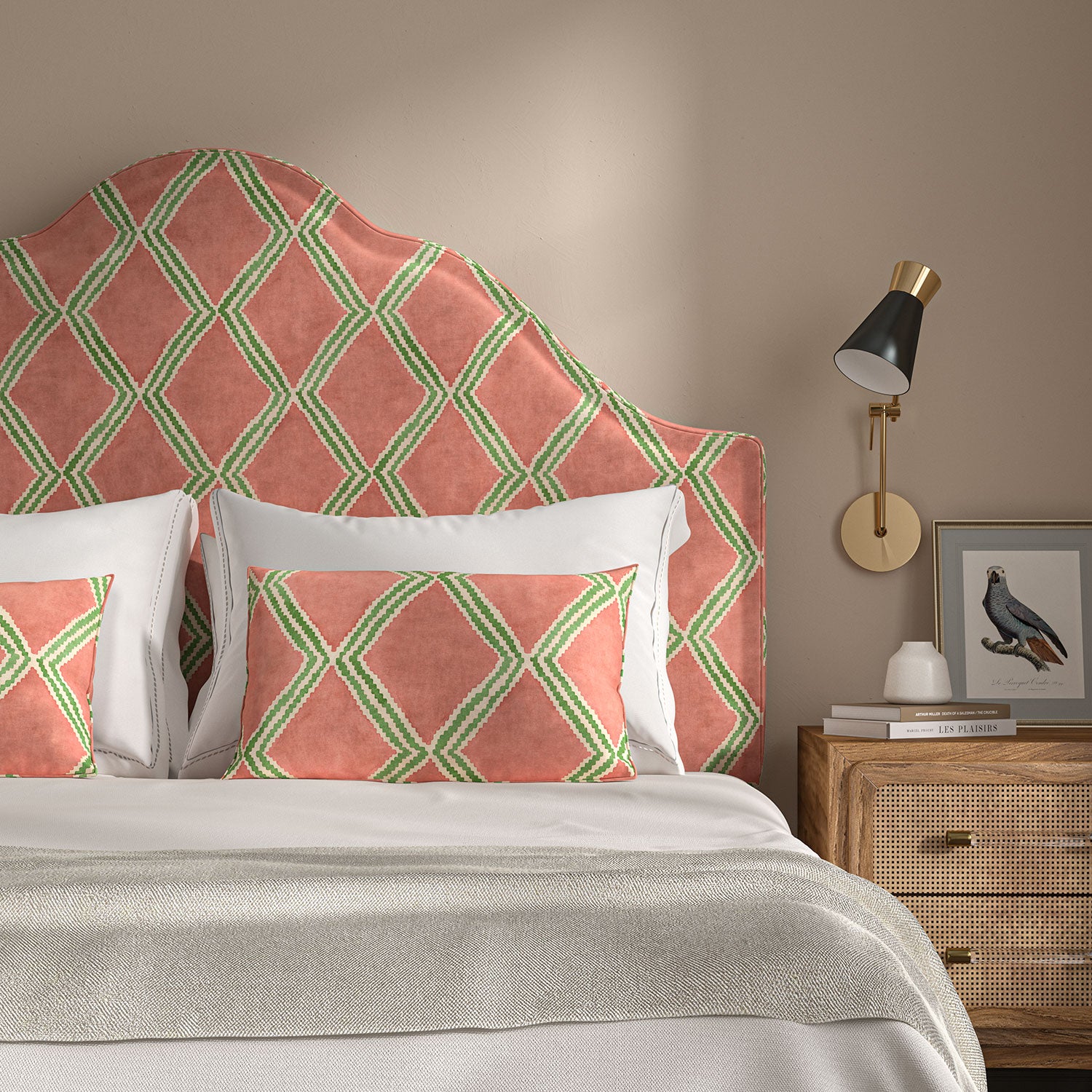 Bedroom with a curved upholstered headboard covered in orange and green printed velvet featuring an irregular diamond motif.
