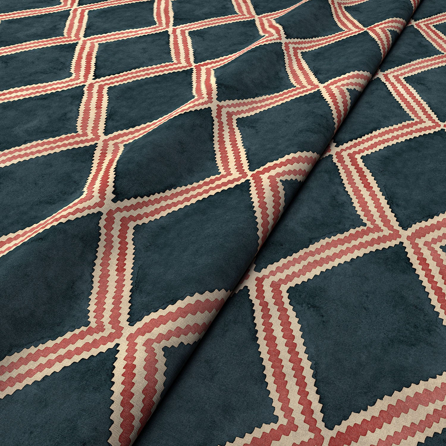 Close-up of blue and red printed velvet fabric featuring an irregular diamond motif with a soft, luxurious pile. 