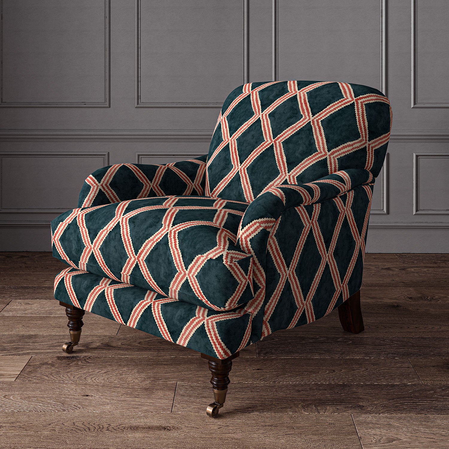 Accent chair upholstered in blue and red printed velvet with an irregular diamond pattern, showcasing the fabric’s rich texture. 