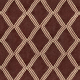 Close-up of plum printed velvet fabric featuring an irregular diamond motif with a soft, luxurious pile. 