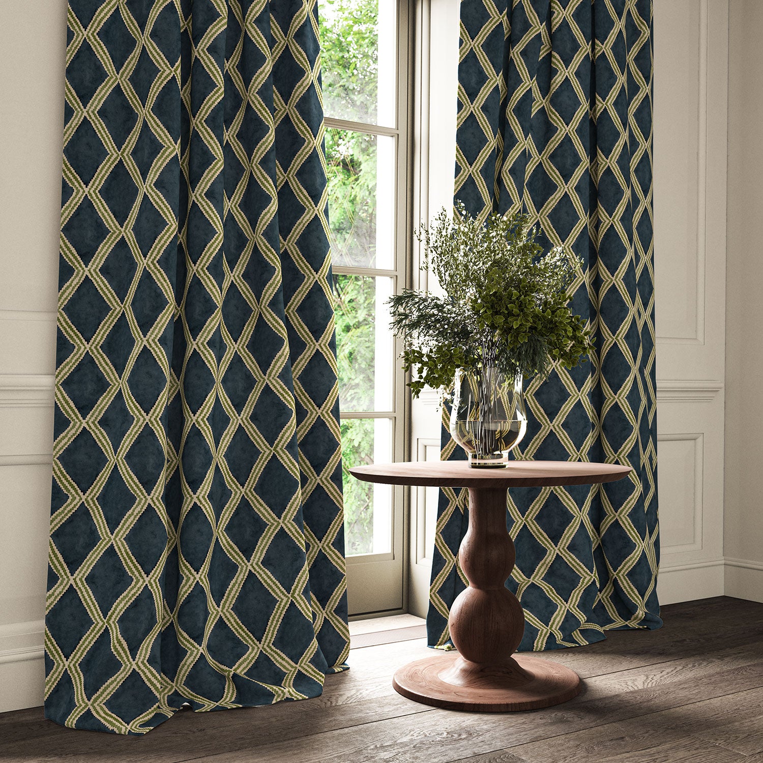 Blue and green printed velvet curtains with an irregular diamond pattern framing a tall window.
