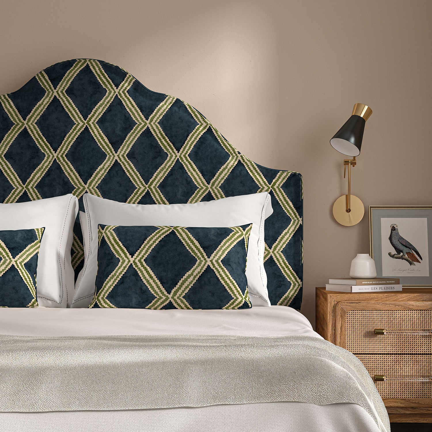 Bedroom with a curved upholstered headboard covered in blue and green printed velvet featuring an irregular diamond motif.