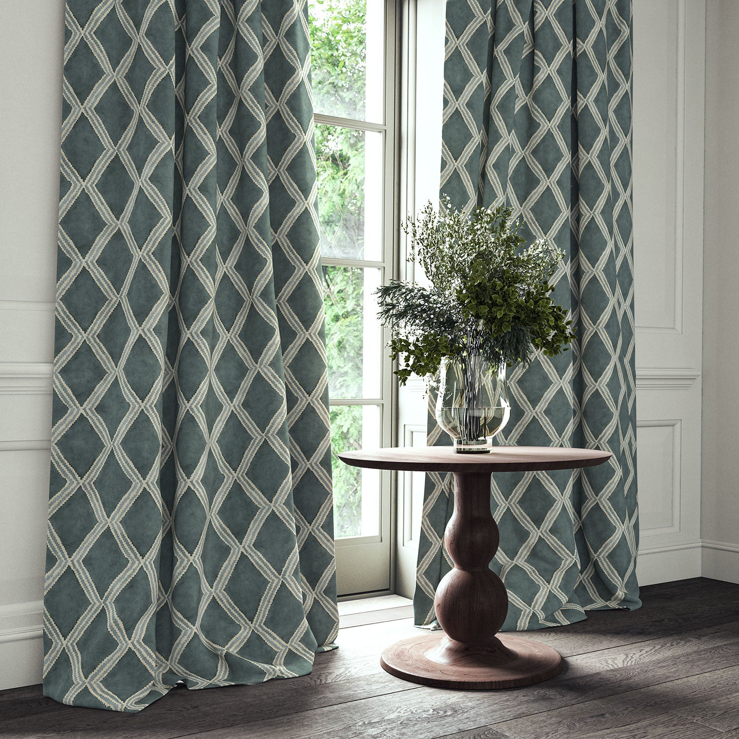 Blue printed velvet curtains with an irregular diamond pattern framing a tall window.