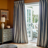 Embroidery curtain fabric with blue, beige, and white stripes on a blue background.