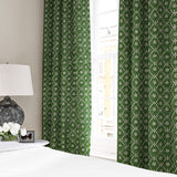 Linen curtain with a hand block-style pattern in green, black and cream