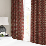 Linen curtain with a hand block-style pattern in red, black and cream