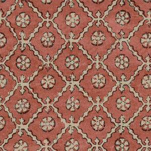 Linen fabric with a hand block-style pattern in red, black and cream