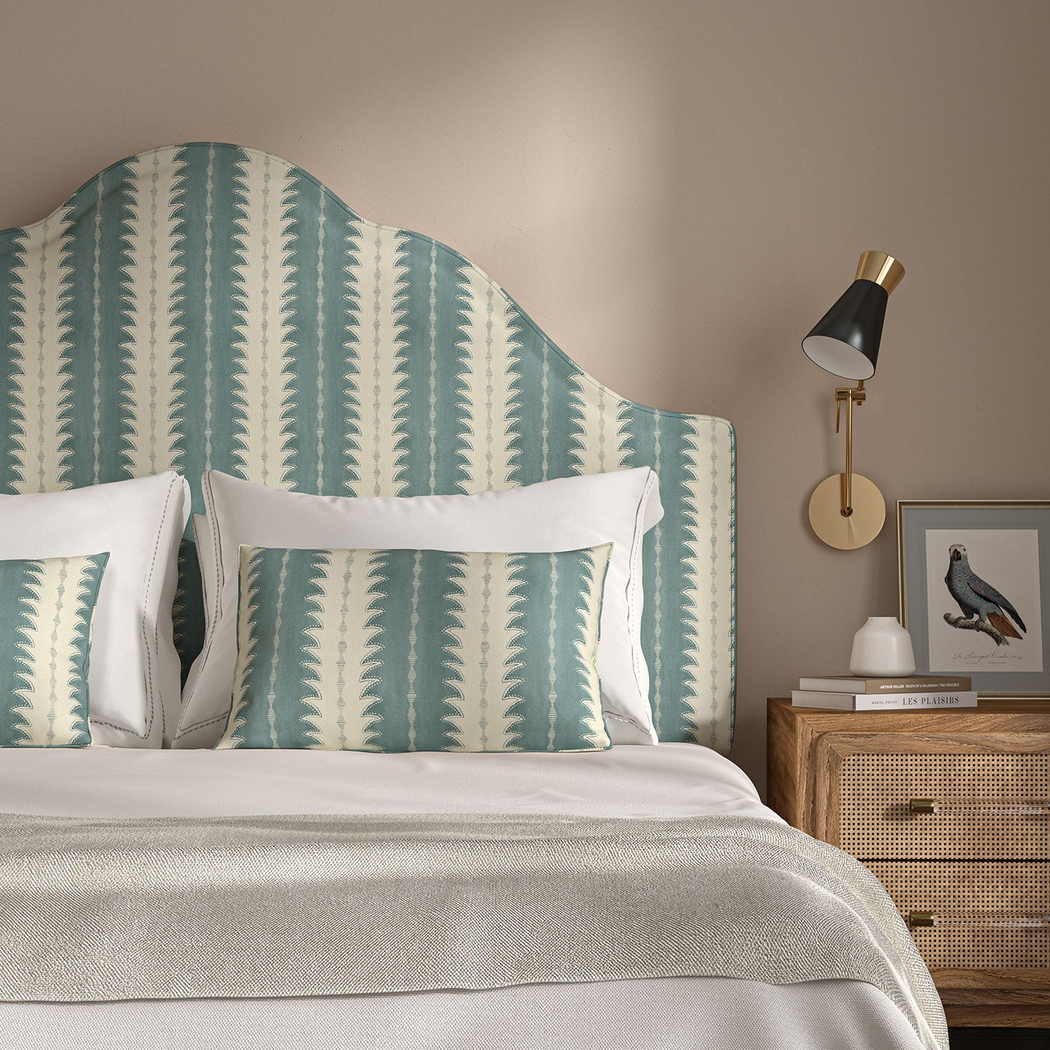 Headboard upholstered in a printed linen fabric in blue and off white, featuring a striped fern design.
