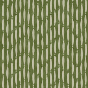 A printed linen fabric sample in green and off white featuring a Japanese print.