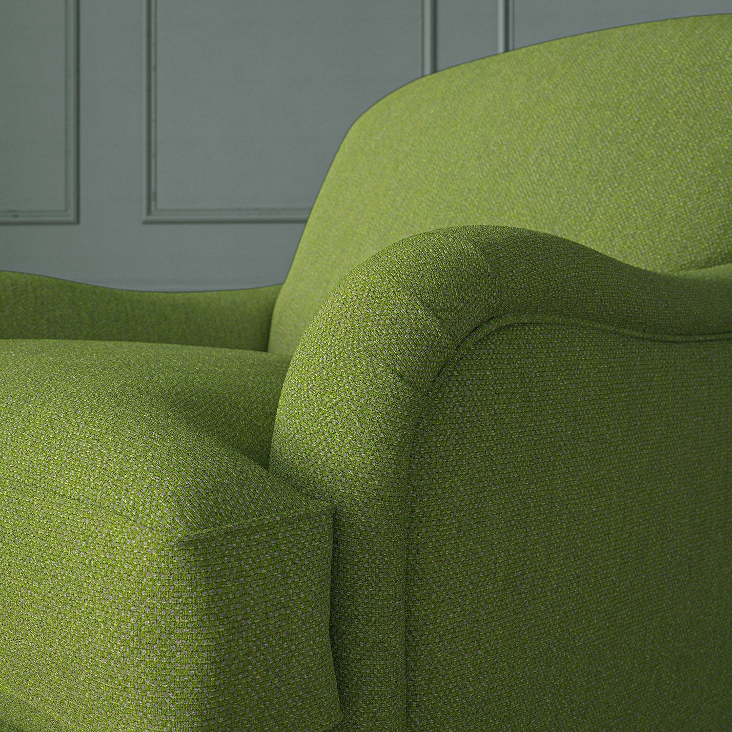 Close up of armchair in Loxley Apple by Linwood – durable, Italian-woven natural fibre fabric in soft green.