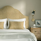 Upholstered headboard in Loxley Buttermilk by Linwood – Italian-woven yellow weave.