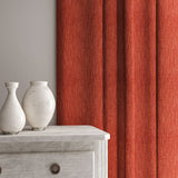 Curtain in Loxley Ember by Linwood – red Italian-woven fabric with rich texture and depth.