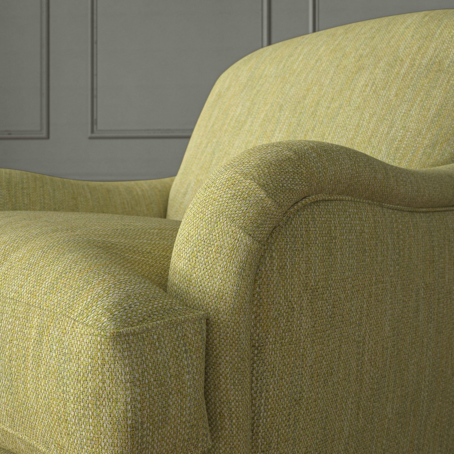 Close-up of armchair in Loxley Lime by Linwood – durable, Italian-woven natural fibre fabric in green.