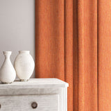 Curtain in Loxley Marmalade by Linwood – orange Italian-woven fabric with rich texture and depth.